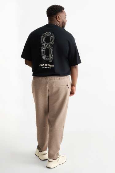 Hommes - Pantalon de jogging - marron clair