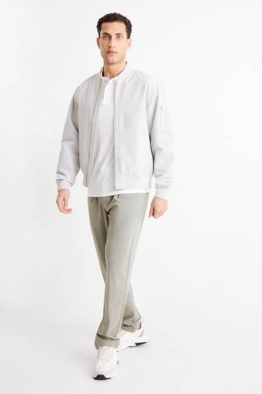 Home - Xinos - tapered fit - gris clar