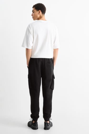 Pánské - Cargo teplákové kalhoty - černá