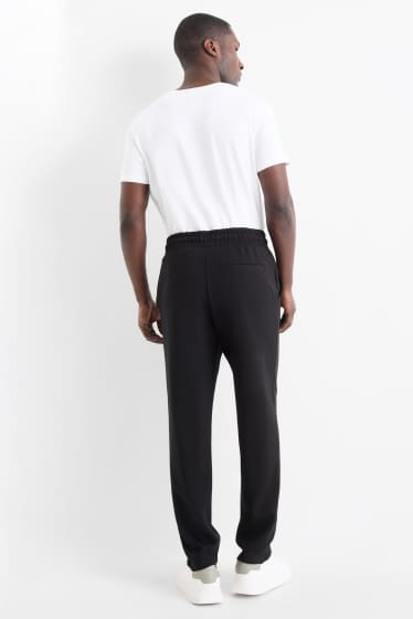 Bărbați - Pantaloni de trening - negru