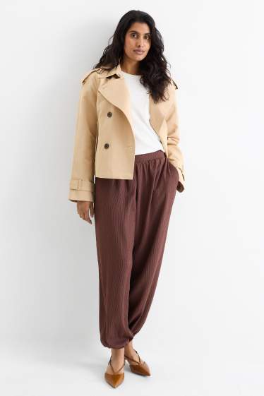 Dames - Jersey broek - mid waist - met structuur - donkerbruin