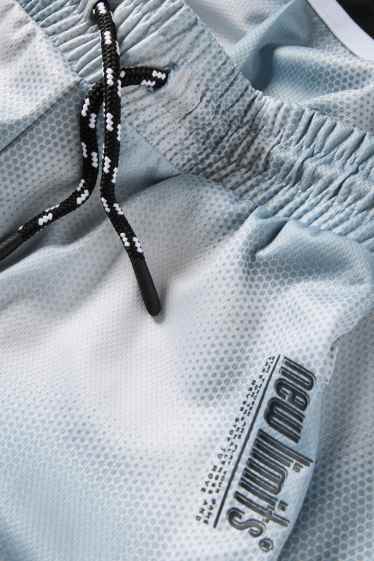 Kinderen: jongens - Sportshort - met patroon - lichtturquoise