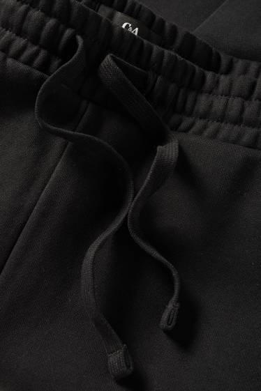 Bărbați - Pantaloni scurți de trening - negru