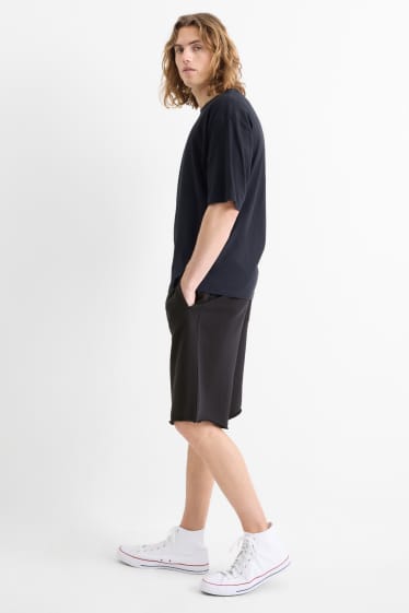 Bărbați - Pantaloni scurți de trening - negru