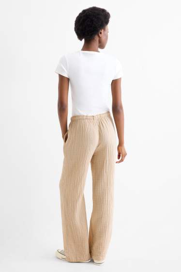 Dámské - Plátěné kalhoty - mid waist - loose fit - béžová