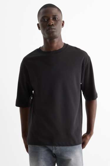 Herren - T-Shirt - Relaxed Fit - schwarz