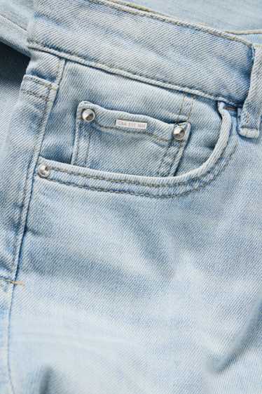 Femei - Flared jeans - talie medie - albastru deschis