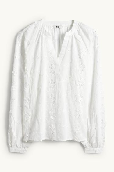 Dona - Brusa amb coll en punta - de flors - texturada - blanc