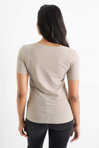 Dames - T-shirt - slim fit - licht beige