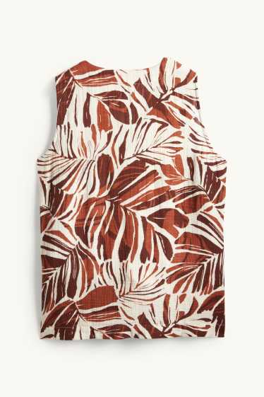 Dona - Armilla - estampada - beix/marró