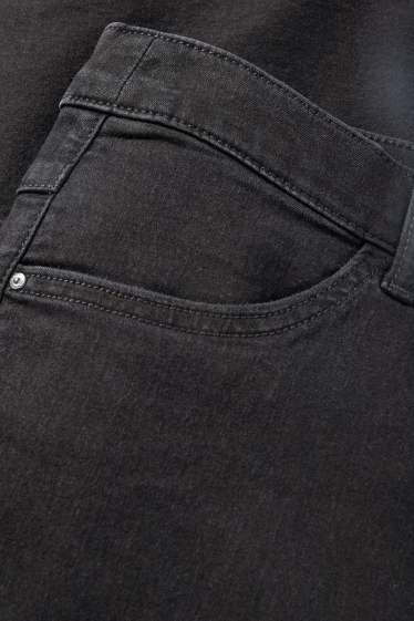 Women - Slim jeans - mid-rise waist - black