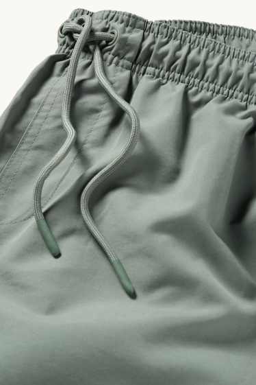 Herren - Badeshorts - grün