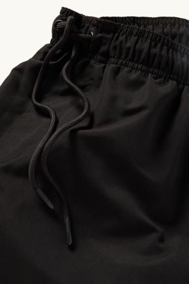 Herren - Badeshorts - schwarz