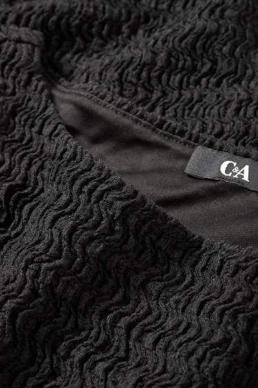 Dames - Bodycon jurk - met structuur - zwart