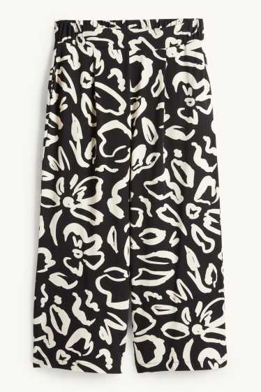 Donna - Pantaloni in jersey - vita media - straight fit - a fiori - nero / beige