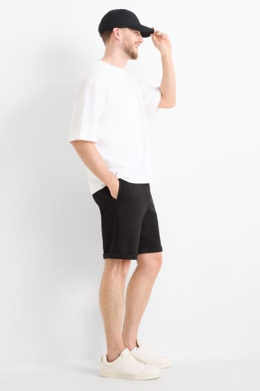 Uomo - Shorts di felpa - tessuto tramato - nero