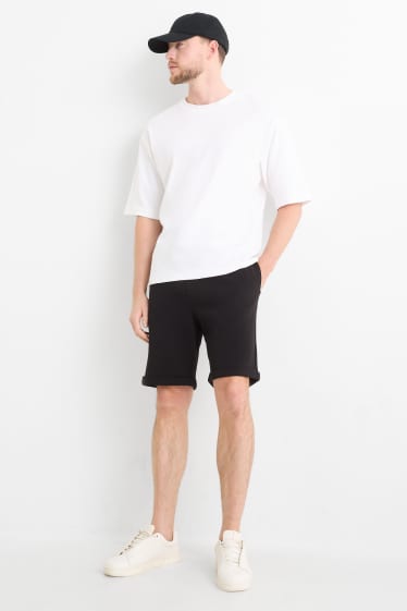 Uomo - Shorts di felpa - tessuto tramato - nero