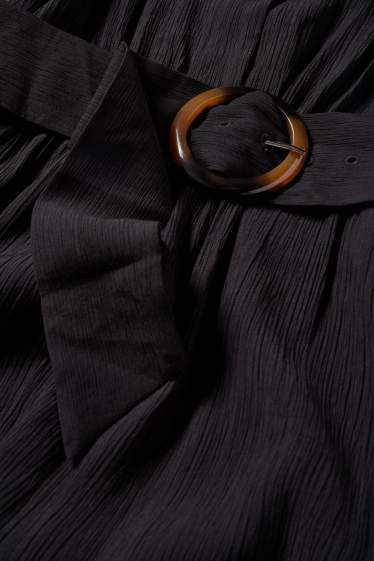 Dona - Granota amb cinturó - texturada - negre