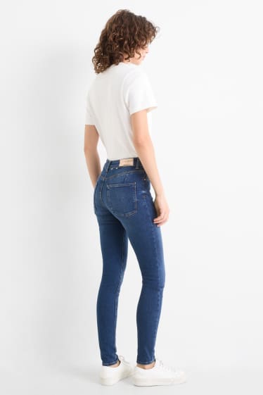 Femei - Skinny jeans - talie medie - jeans modelatori - LYCRA® - albastru închis