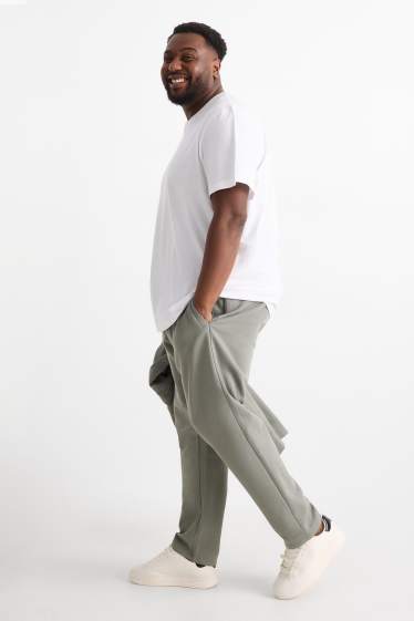 Hommes - Pantalon de jogging - vert