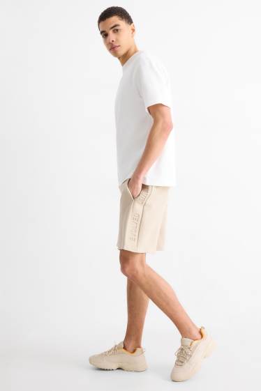 Bărbați - Pantaloni scurți de trening - bej