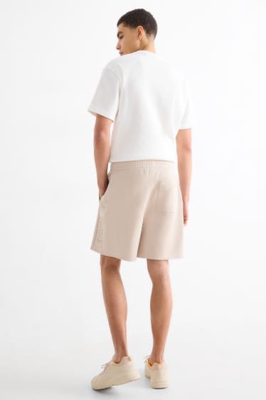 Bărbați - Pantaloni scurți de trening - bej