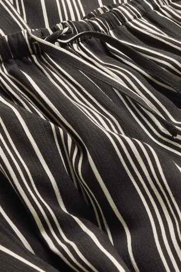 Nena - Pantalons de tela - de ratlles - blanc/negre