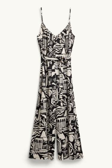 Femei - Salopetă cu decolteu în V și curea - cu model - negru / alb