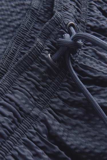Hommes - Short de bain - finition texturée - bleu foncé