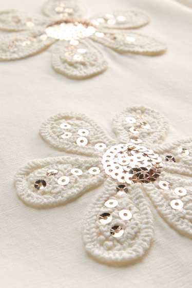 Bambine - Fiore - maglia a maniche corte - effetto brillante - bianco crema