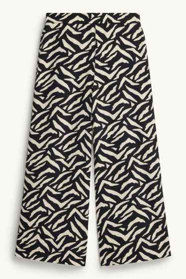 Dona - Pantalons de tela - mid waist - straight fit - estampats - blanc/negre