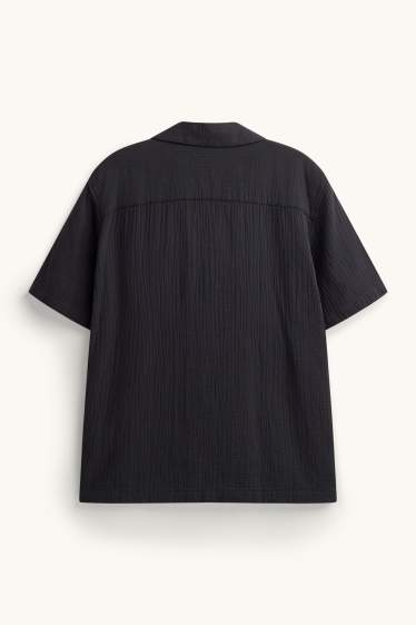 Home - Camisa - relaxed fit - coll solapa - negre