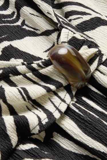 Dames - Fit & flare-jurk met V-hals - met patroon - wit / zwart