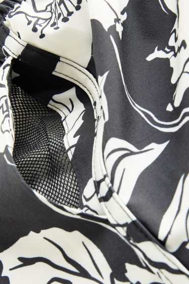 Dames - Bikinishort - LYCRA® - gebloemd - zwart / wit