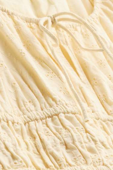 Dames - Jurk - broderie anglaise - geel