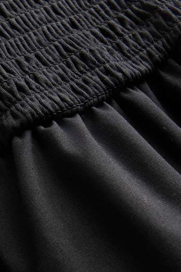 Femmes - Robe fit & flare - finition smockée - noir