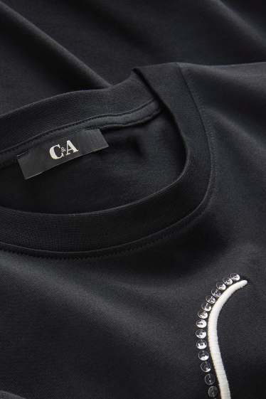 Dames - T-shirt - regular fit - glanseffect - zwart