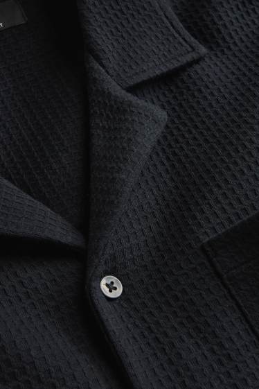 Hommes - Chemise - relaxed fit - col à revers - finition texturée - noir