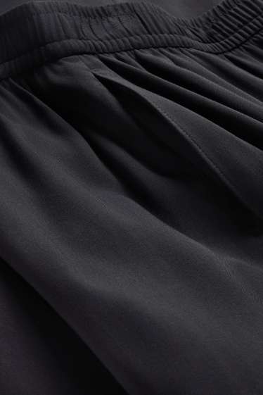 Women - Cloth trousers - high waist - wide leg - black