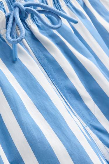 Men - Swim shorts - striped - blue / white