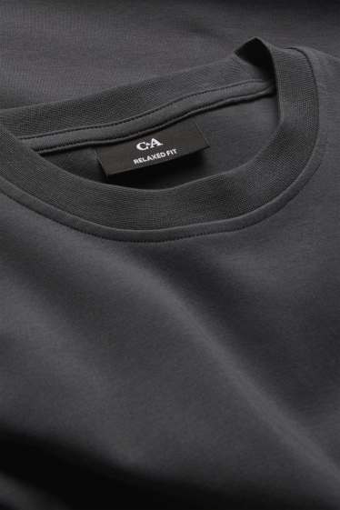 Herren - T-Shirt - Relaxed Fit - schwarz
