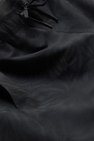 Herren - Badeshorts - gemustert - schwarz