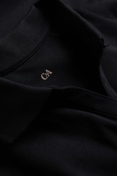 Dona - Polo - regular fit - negre