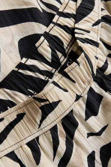 Femmes - Pantalon en toile - high waist - palazzo - à motif - beige