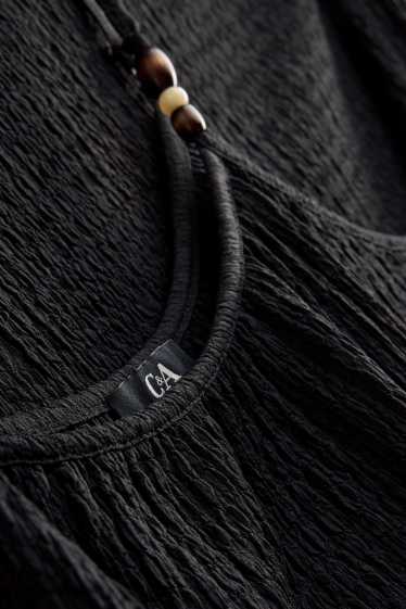 Dames - A-lijn-jurk - met structuur - zwart