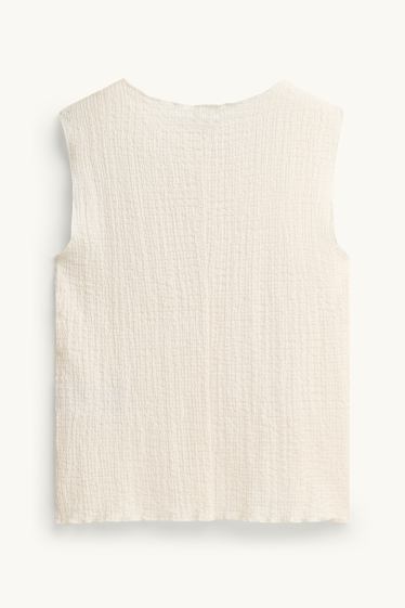 Femmes - Caraco - finition texturée - blanc crème