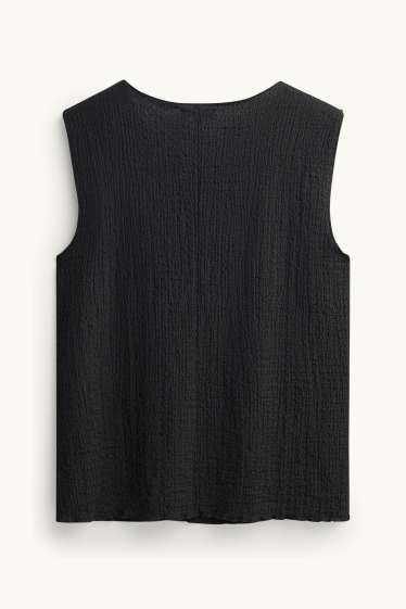 Femmes - Caraco - finition texturée - noir