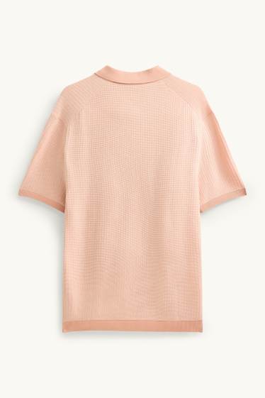Heren - Gebreid poloshirt - relaxed fit - met structuur - oranje