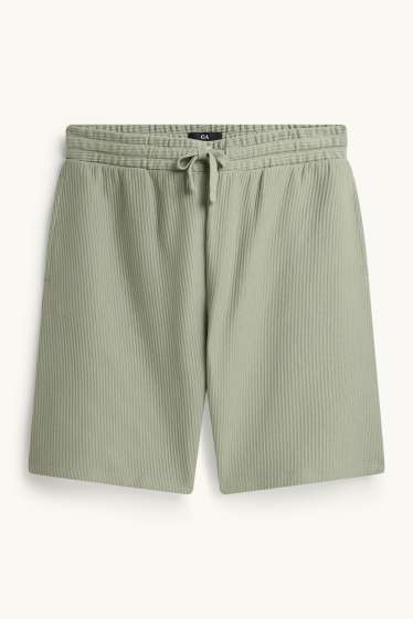 Uomo - Shorts - tessuto tramato - verde