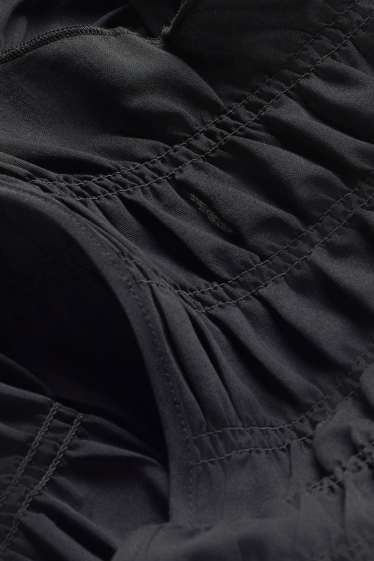 Femmes - Chemisier - finition smockée - noir